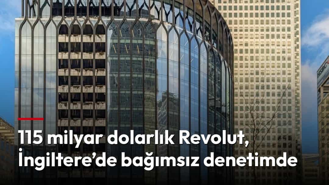 Revolut yazısının yer aldığı cam ofis binası, çevresindeki yüksek yapılarla birlikte görüntüleniyor.