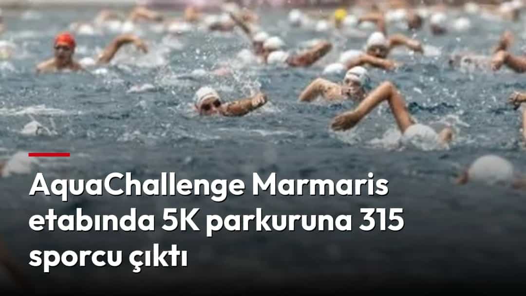 AquaChallenge Marmaris 5K açık su yüzme yarışında sporcular denizde kulaç atıyor.