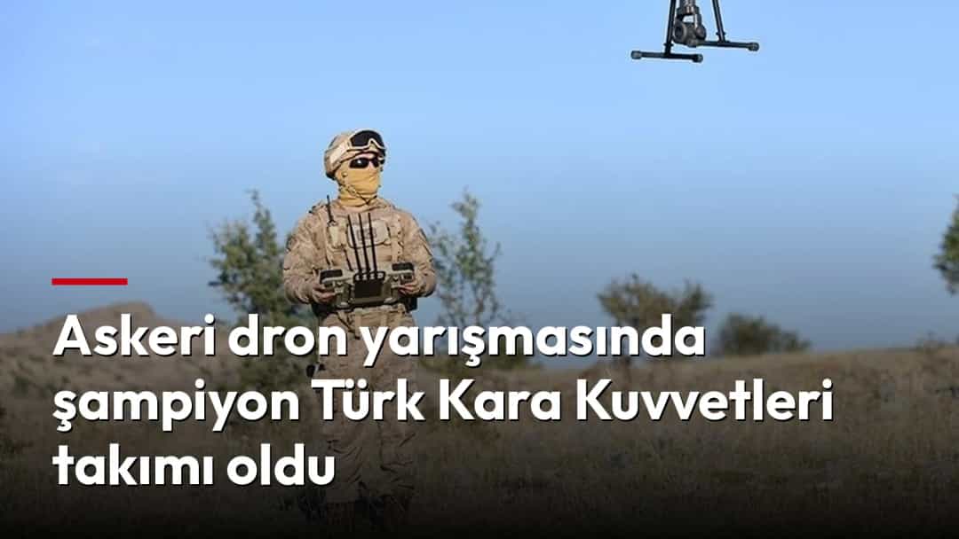 Açık arazide bir asker kumandayla uçan askeri dronu kontrol ediyor.