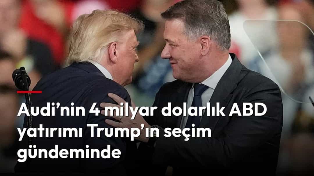 Donald Trump, kalabalık bir etkinlikte takım elbiseli bir erkekle selamlaşıyor.