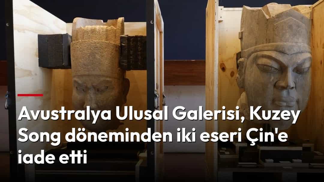 Ahşap koruyucu sandıklar içinde sergilenen iki taş heykel başı