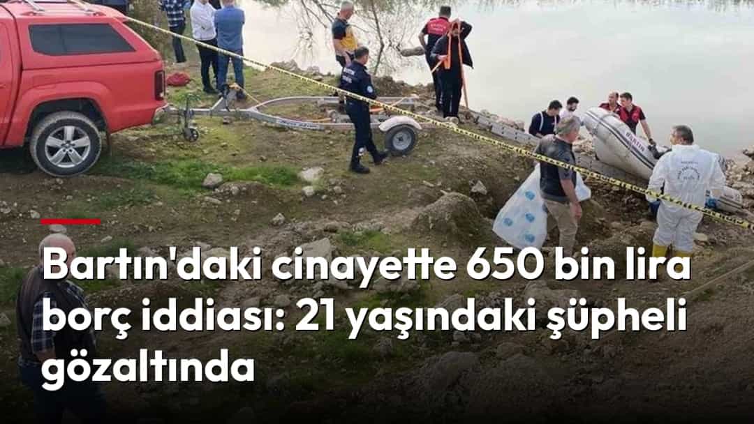 Acil ekipler, güvenlik şeridi çekilen nehir kıyısında çalışma yapıyor.