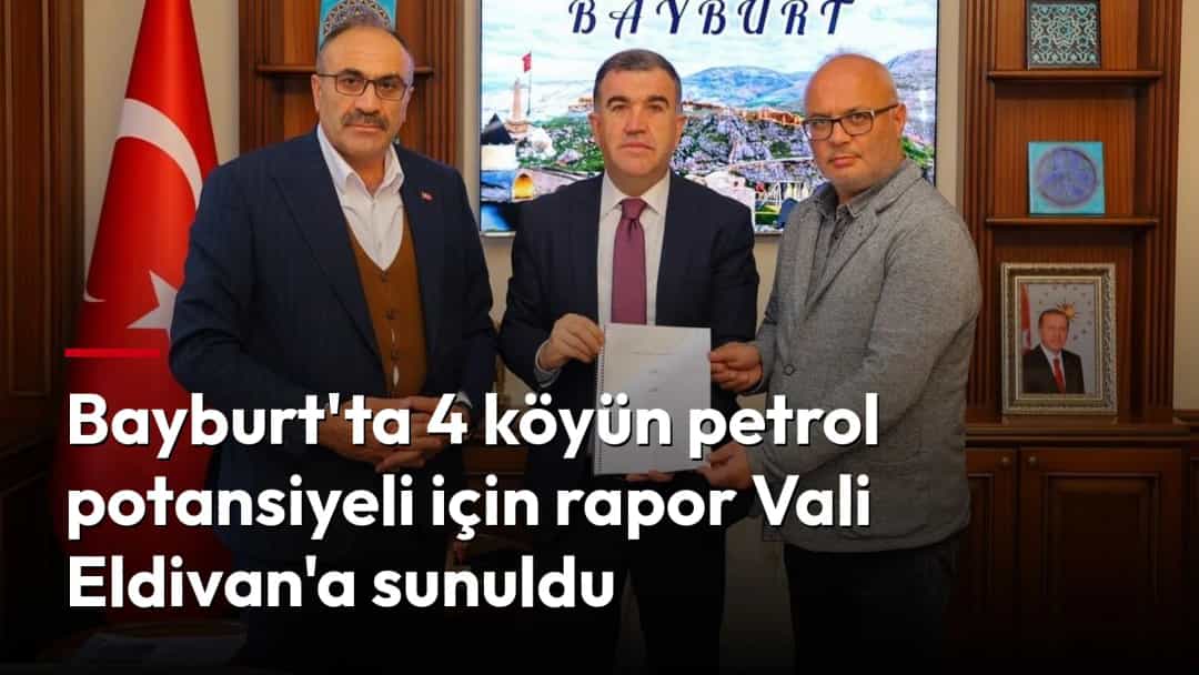 Bayburt Valisi Mustafa Eldivan, iki kişiyle birlikte petrol potansiyeline ilişkin teknik raporu tutuyor.