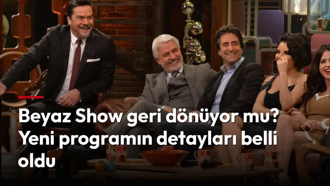 Beyazıt Öztürk, bir talk show programında konuklarla birlikte otururken gülüyor.