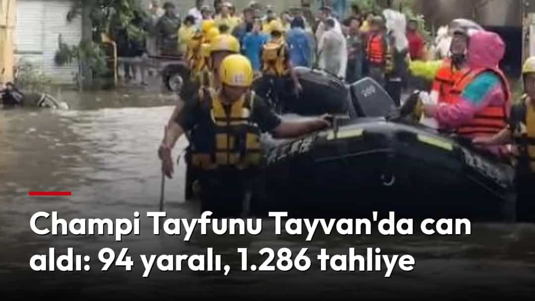 Tayvan’da sel sularının yükseldiği bir sokakta kurtarma ekipleri botla tahliye çalışması yapıyor.