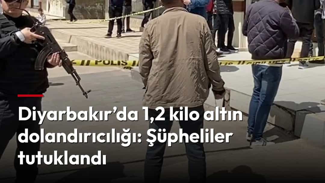 Kuyumcu dükkânının önünde güvenlik şeridi çekilmiş; polisler ve çevredekiler olay yerinde.