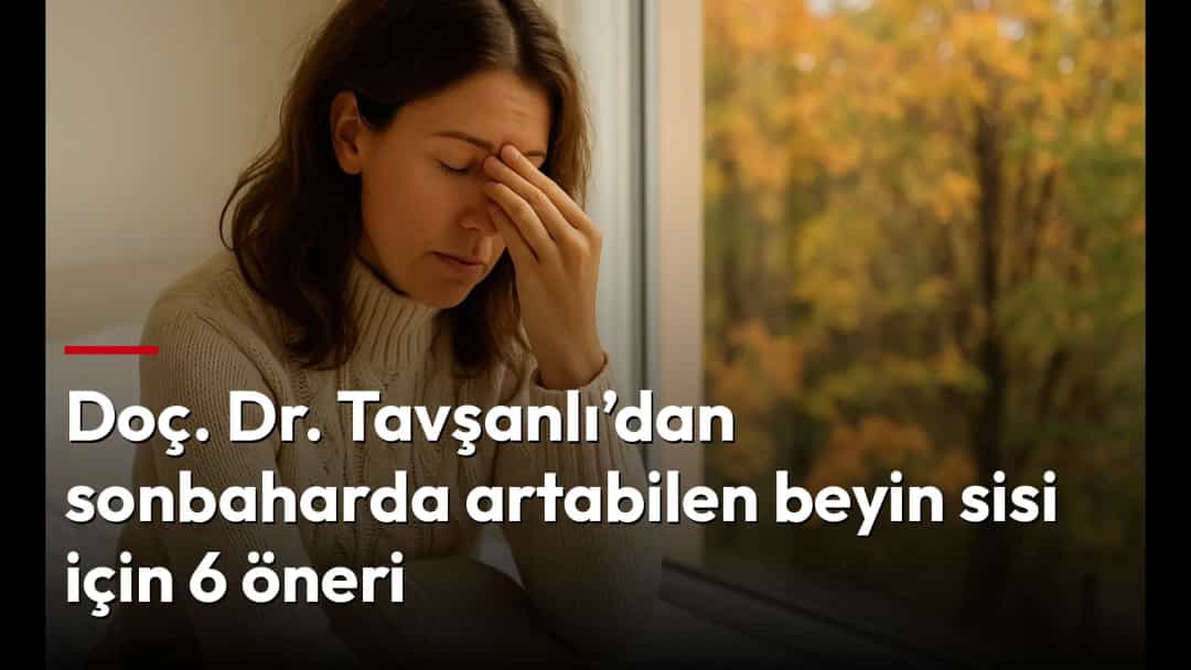Sonbahar manzarasına bakan pencerinin yanında oturan kadın, yorgun görünerek gözlerini ovuşturuyor.