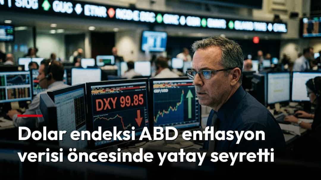 Döviz işlem salonunda, DXY göstergesinin yer aldığı ekranların önünde çalışan bir piyasa uzmanı.