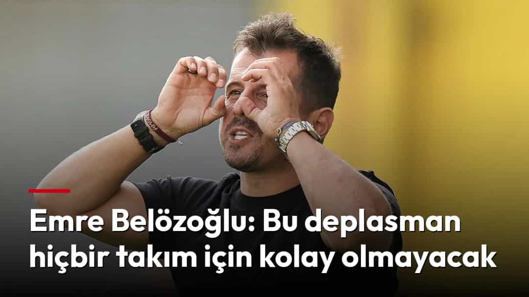 Emre Belözoğlu, siyah tişörtüyle saha kenarında ellerini yüzüne götürerek işaret yapıyor.