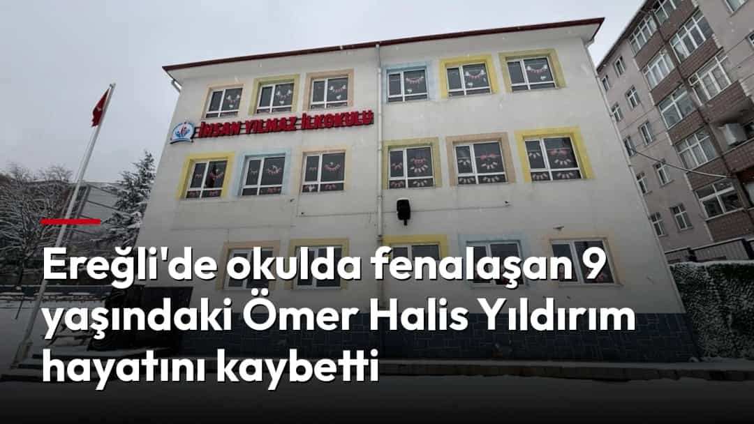 Kar yağışı altında kalan okul binasının dış görünümü.