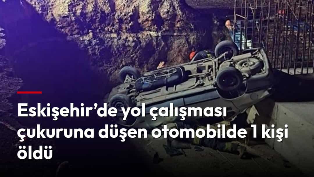 Eskişehir'de kazı çukuruna düşerek ters dönen otomobil ve olay yerindeki ekipler