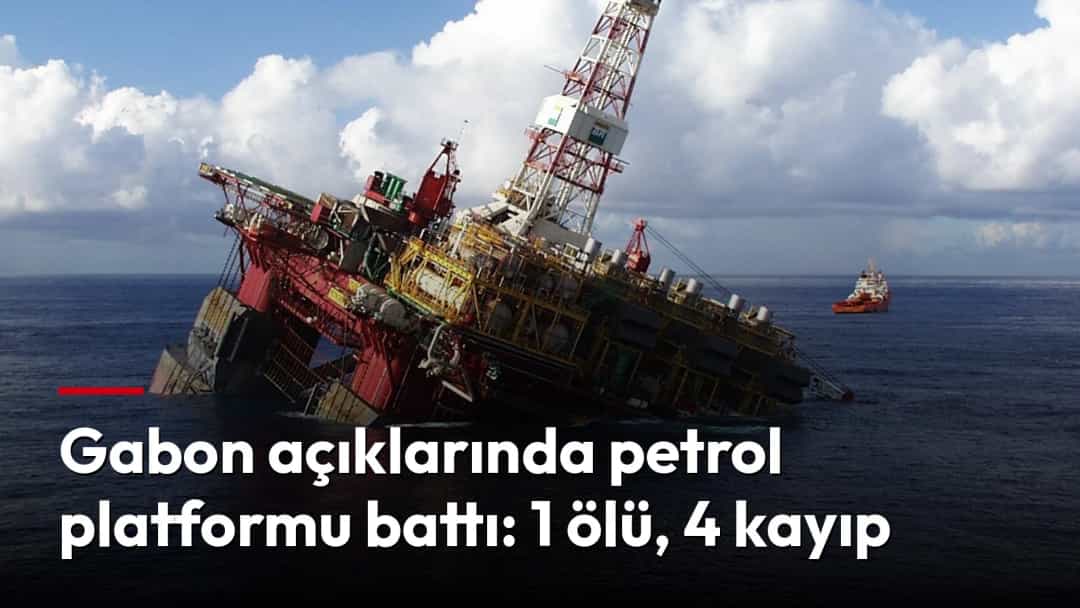 Denizde yan yatarak batmakta olan petrol platformu.