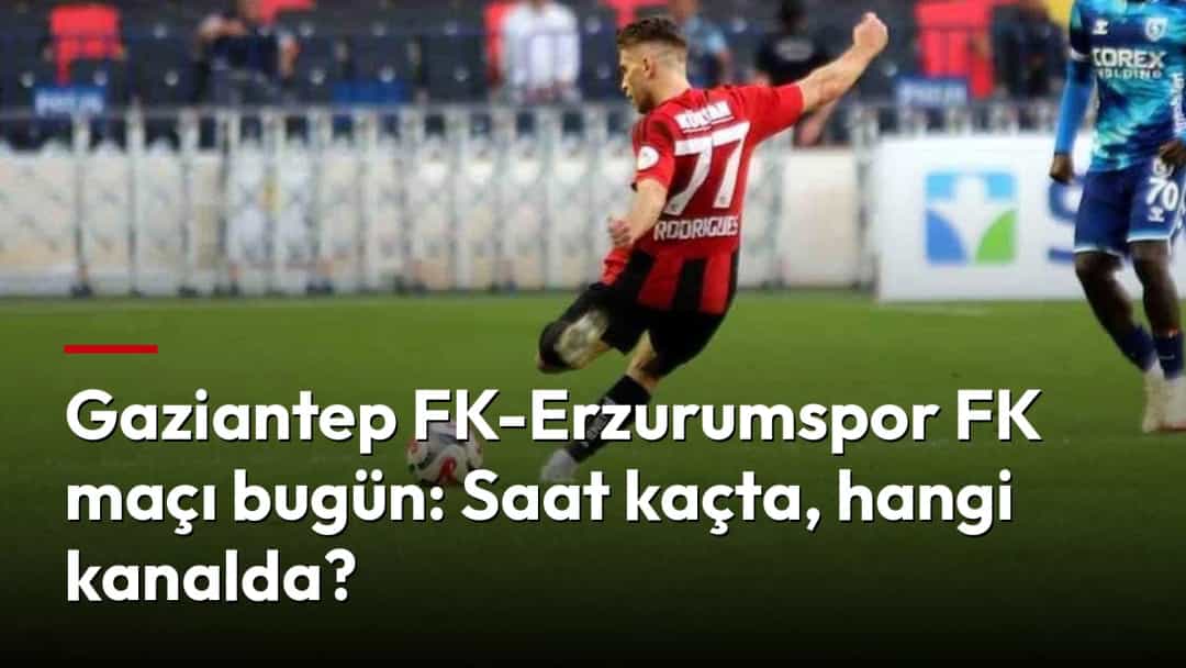 Gaziantep FK forması giyen futbolcu, rakip oyuncunun baskısı altında topa vuruyor.