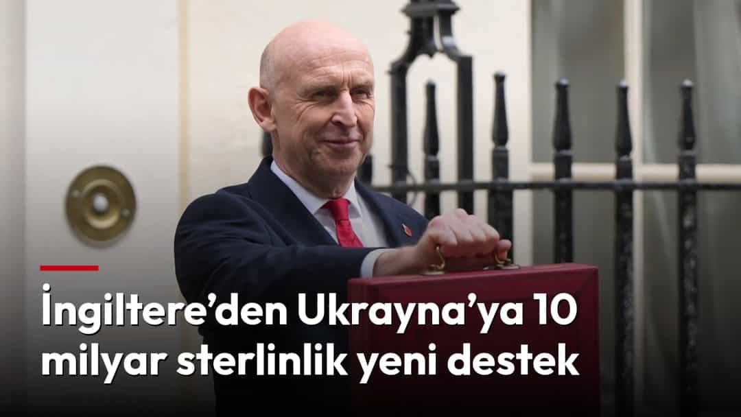 İngiltere Maliye Bakanı, kırmızı bütçe çantasını taşıyor.