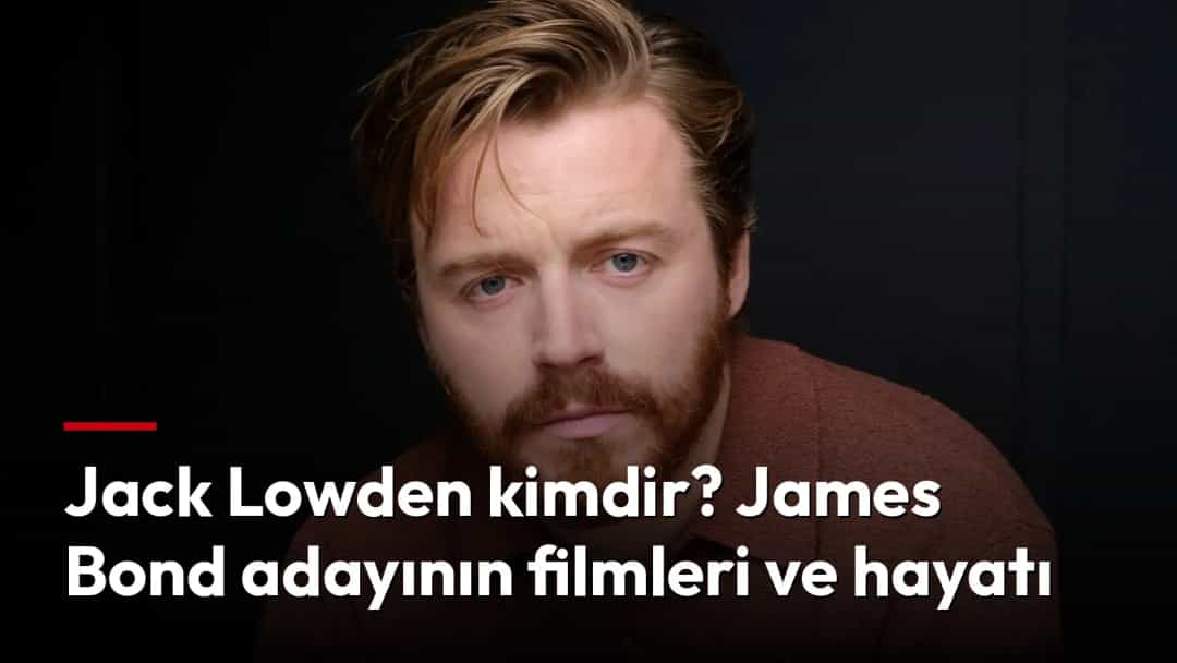 Jack Lowden, koyu arka plan önünde kahverengi gömlekle kameraya bakıyor.