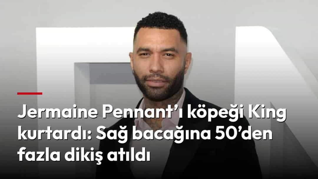 Jermaine Pennant, siyah ceket ve açık renk gömlekle bir etkinlikte poz veriyor.