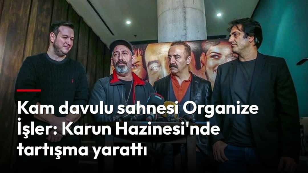 Yılmaz Erdoğan ve film ekibi basın toplantısında mikrofonların önünde bir arada duruyor.