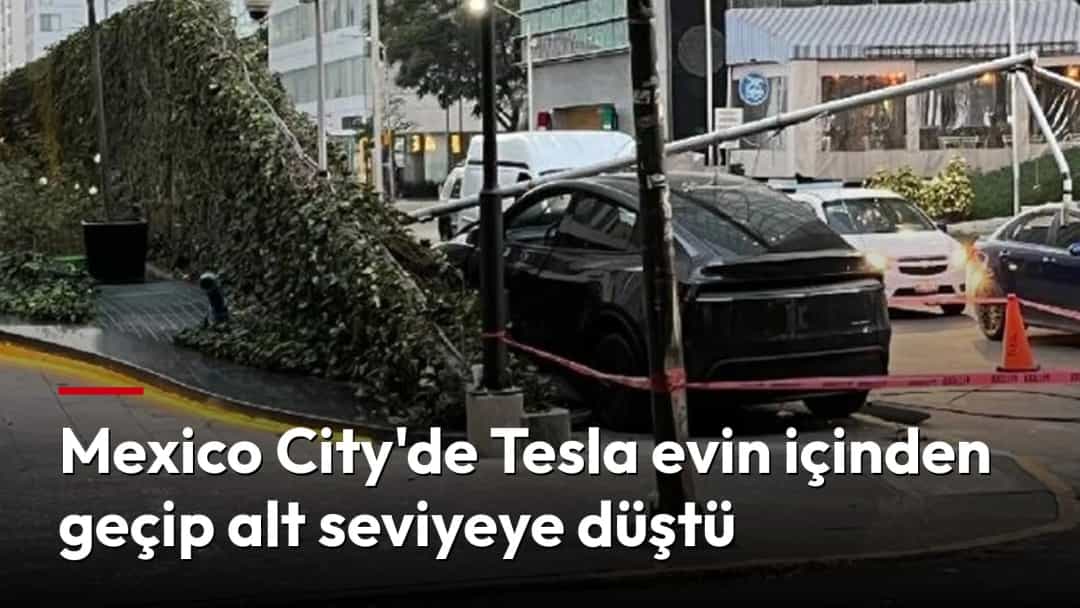 Kaza sonrası Mexico City’de bir binanın önünde duran Tesla ve çevrede güvenlik önlemi alan görevliler.