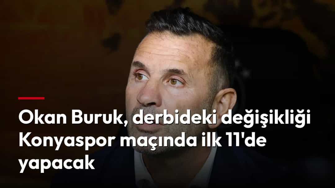 Okan Buruk, koyu renk ceket ve beyaz gömlekle bir yöne bakıyor.