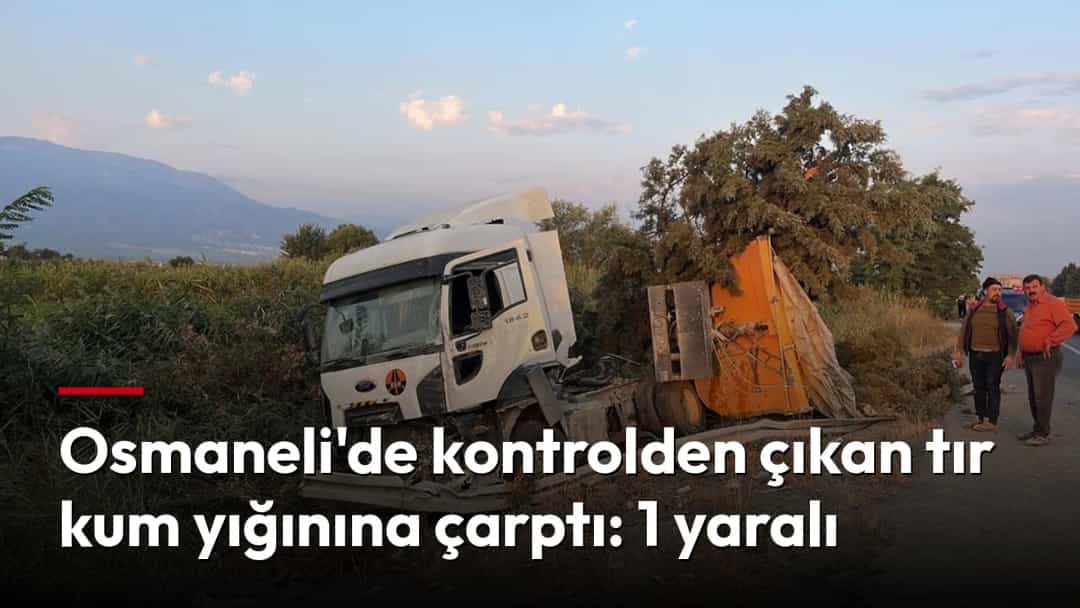 Kontrolden çıkarak yol kenarına savrulan, ön kısmı hasar görmüş tır.