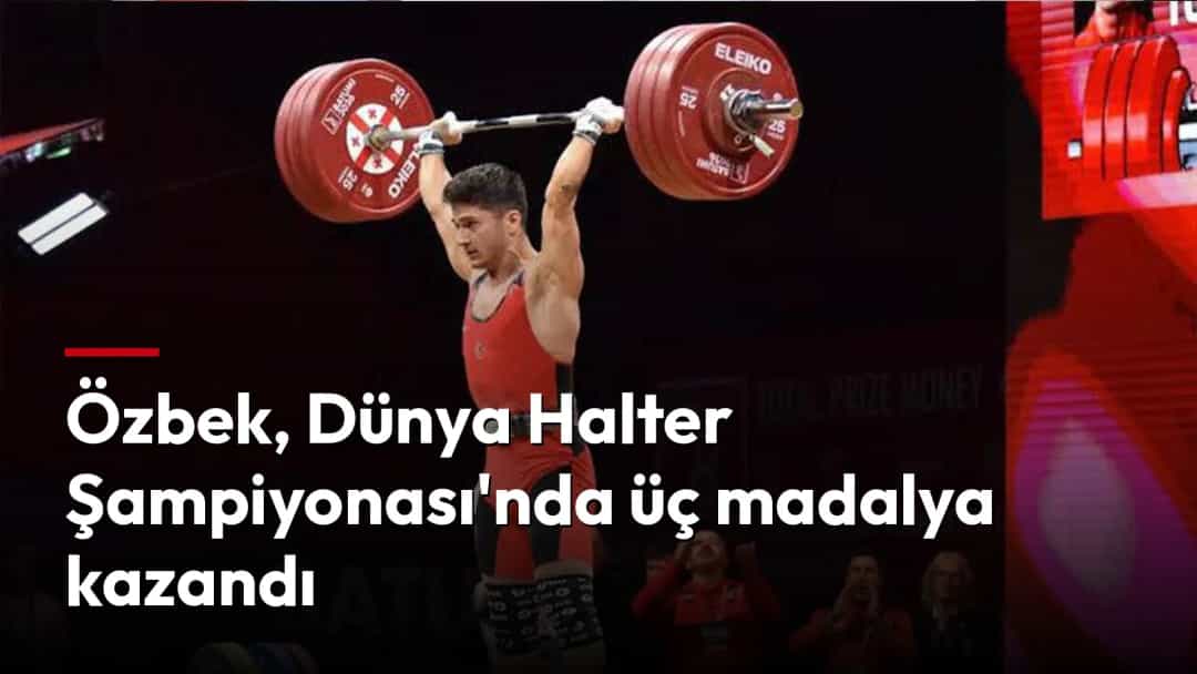 Muhammed Furkan Özbek, halter müsabakasında ağırlığı başının üzerinde kaldırıyor.