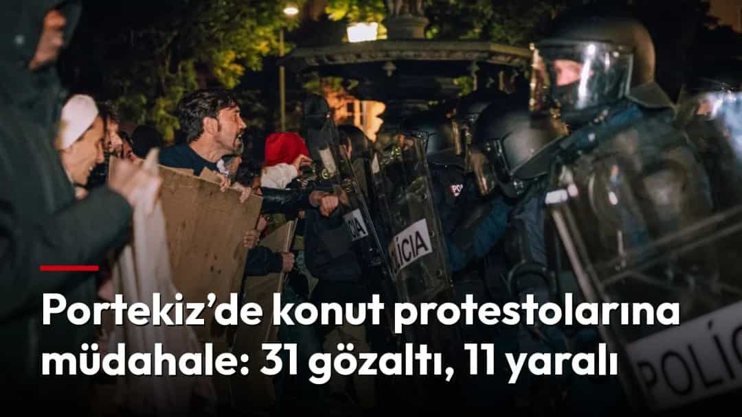 Gece düzenlenen konut protestosunda göstericiler ile kalkanlı polisler karşı karşıya.