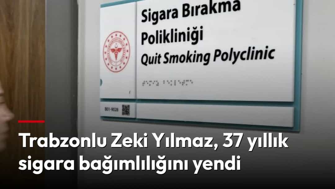 Sigara bırakma polikliniğinin tabelası önünden geçen bir kadın