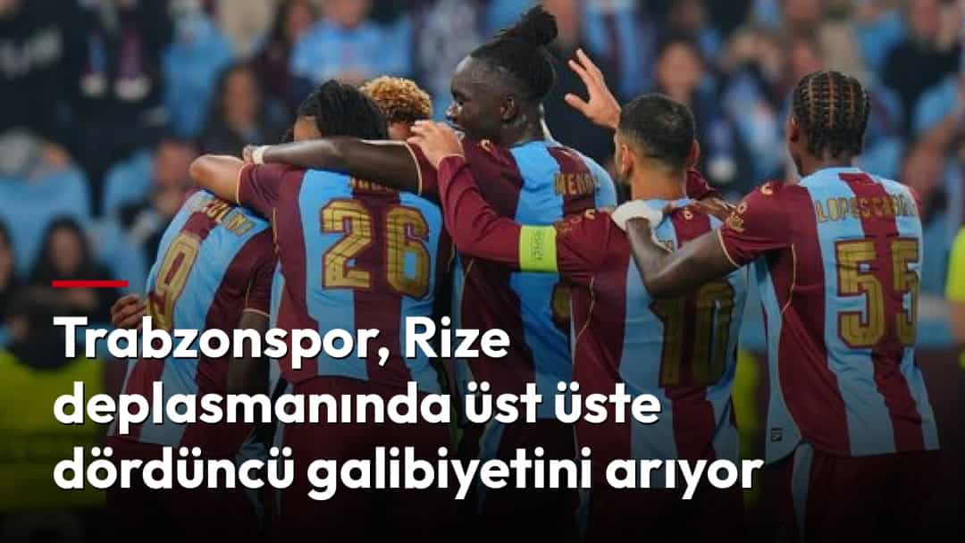Trabzonsporlu futbolcular, maç sırasında birbirlerine sarılarak galibiyeti kutluyor.