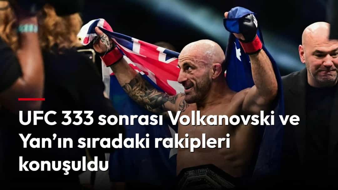 Alexander Volkanovski, Avustralya bayrağını kaldırarak kutlama yapıyor.