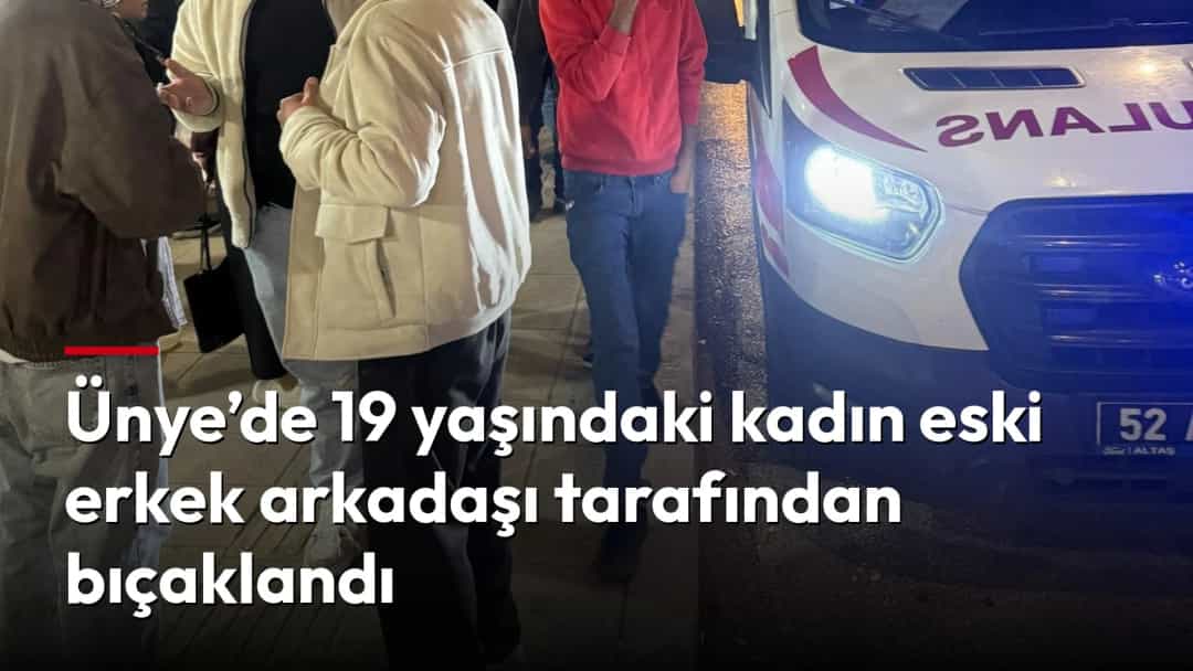 Gece saatlerinde bir sokakta ambulansın yanında toplanan insanlar