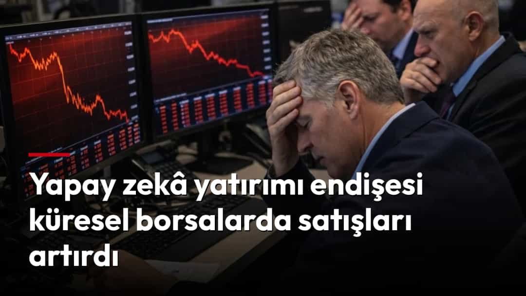 Borsa işlem salonunda düşen piyasa grafiklerini izleyen endişeli bir aracı kurum çalışanı.